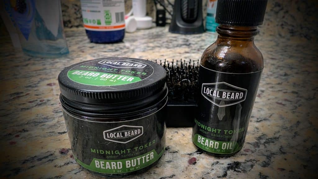 Local Beard Midnight Toker beard oil (1 oz) and beard butter (2 oz) on a granite bathroom counter