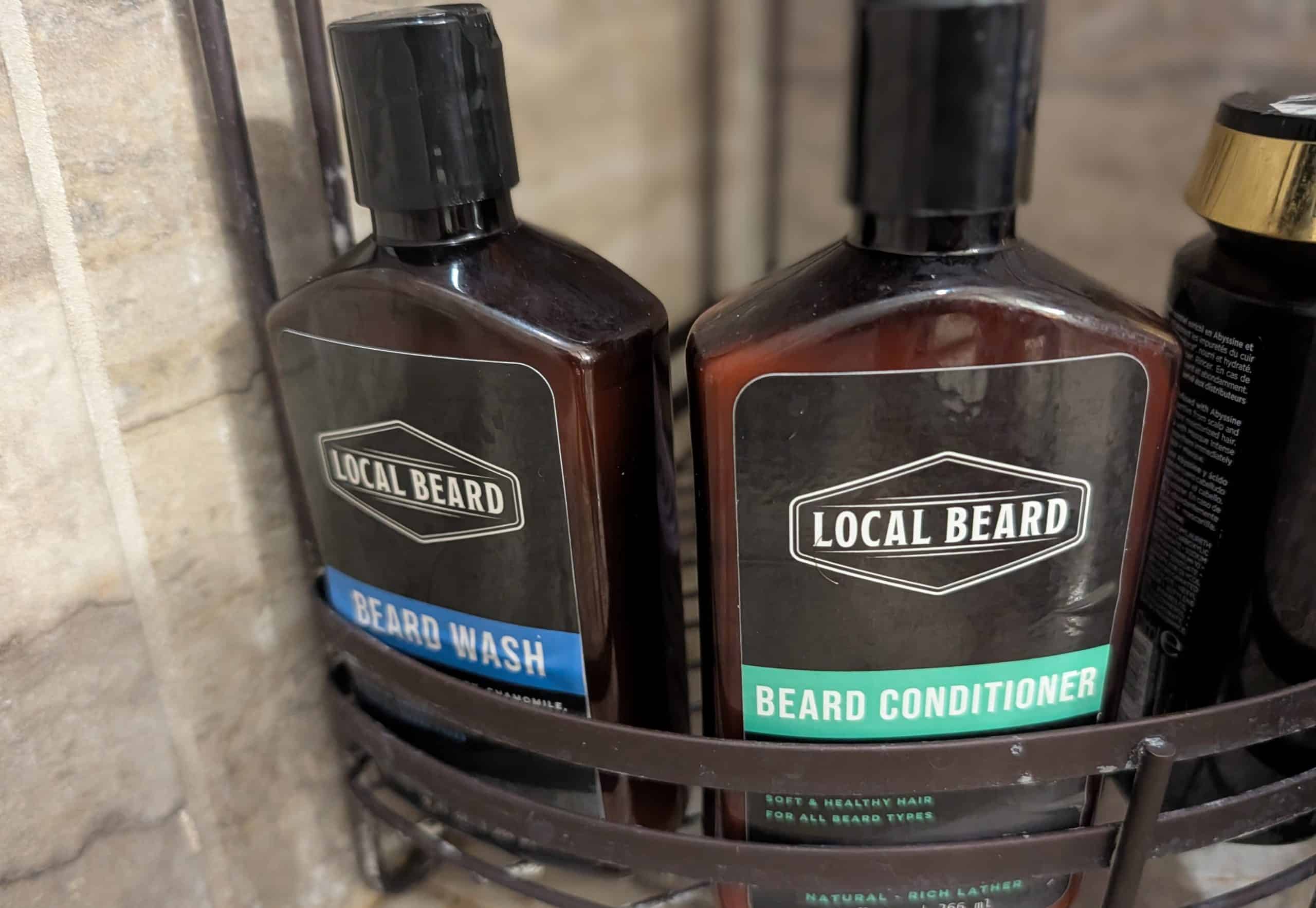 Local Beard Beard Wash and Beard Conditioner bottles in a shower caddy